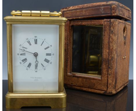 A French brass cased carriage clock, white enamel dial, signed T R RUSSELL 3247, PARIS, platform escapement, striking on a go