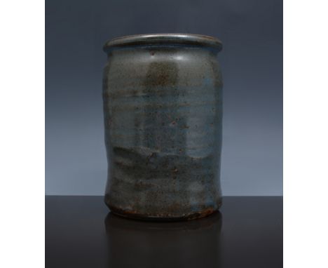 A Bernard Leach vase, circa 1960, stoneware, the cylindrical body with speckled blue and brown glaze, impressed 'BL' and Leac