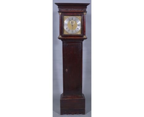 An oak longcase clock, square brass dial, signed Wm Lee, silvered chapter ring with subsidiary second dial and date aperture,