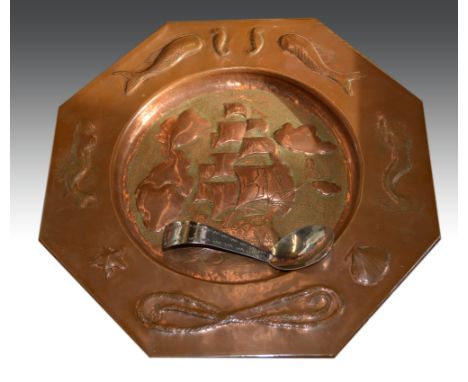 A Keswick School of Industrial Arts caddy spoon, white planished metal with zigzag decoration to handle, stamped "BMI Keswick