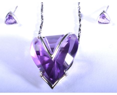 Cathy Stephens heart shape amethyst pendant, in stylised white metal setting, suspended from a faceted link chain, boxed and 