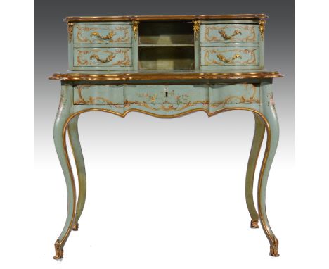 A Venetian grey-green painted and parcel gilt writing table, probably late 19th Century, serpentine outlines, painted with fl