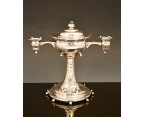 An English Arts and Crafts silver offering cup and cover, 1908,  the cup applied with twin arms supporting candle sconces, ra