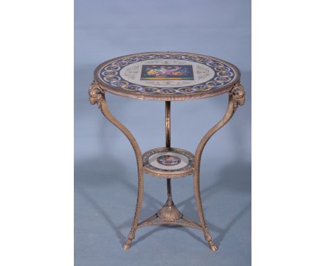 A gilt metal and ceramic inset pedestal gueridon, in the Louis XVI style, circular top, decorated with a floral panel within 