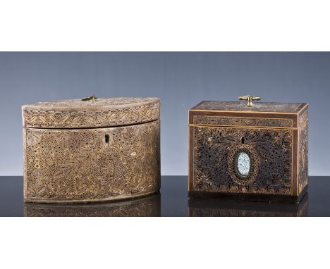 A George III rolled paper and mahogany oblong shape tea caddy, with boxwood stringing at the front aspect, with an oval mirro