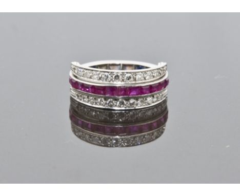 A sapphire, ruby and diamond "Night & Day" full eternity ring, in white metal, double hinged, line edge set, finger size N.