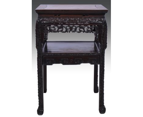 A Chinese carved hardwood stand, square shape top with marble inset (damaged), opened scrolled frieze, the undertier with a k