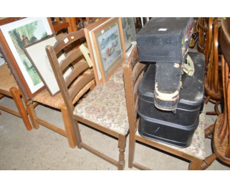 A set of six oak ladder back dining chairs