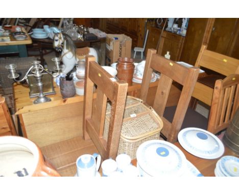 A pair of wooden high back dining chairs; a light oak dining chair; and a pine chair 