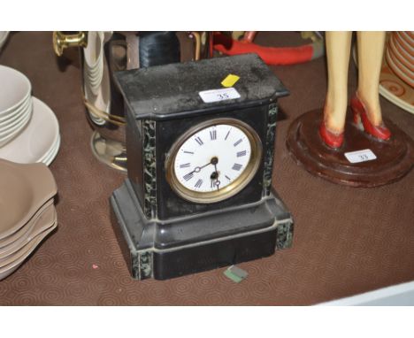 A late Victorian black slate and marble single hole mantel clock 