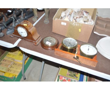 An Edwardian mahogany and inlaid mantel clock; a circular cased barometer and a clock and barometer set