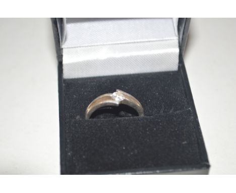 A 925 silver ring (size N) set with white stone 