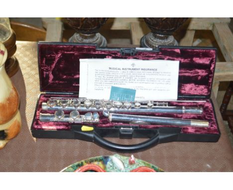 A Buffet silver plated flute in carrying case