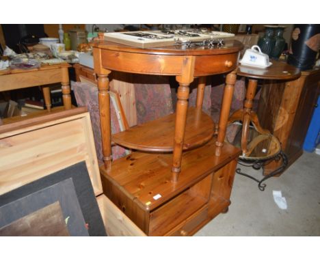 A Victoria pine TV stand; and a Ducal pine demi-lune hall table 