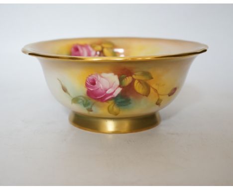 A Royal Worcester bowl decorated with roses, signed M Hunt, 8cm
