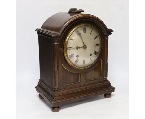 An Edwardian mantel clock, with two train movement, striking and chiming on five coiled gongs, 35cm excluding handle