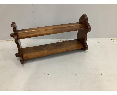 A late Victorian walnut two tier wall bracket, width 74cm, depth 20cm, height 37cm