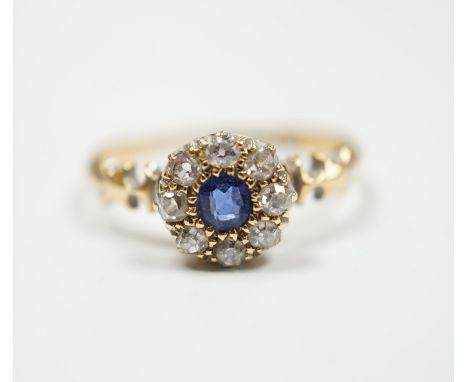 A late Victorian 18ct gold, sapphire and diamond set circular cluster ring, Birmingham, 1889, size M, gross weight 2.7 grams.
