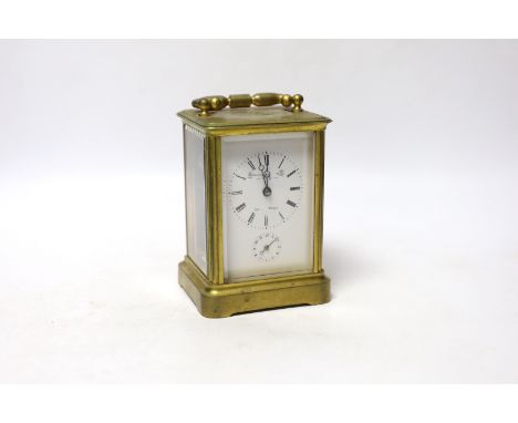 A French brass carriage clock striking on a bell, 12cm