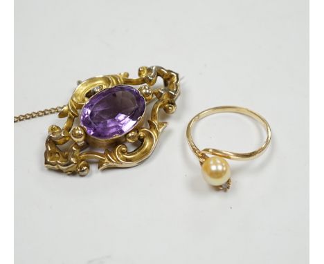 A late Victorian yellow metal mounted amethyst brooch, 38mm pendant and a 10k, cultured pearl and diamond set two stone ring.