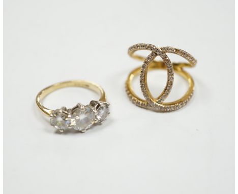 A 9ct gold and three stone simulated diamond ring and a gilt 925 ring.