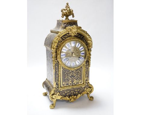 A late 19th century French cut brass inlaid mantel clock, 32cm high