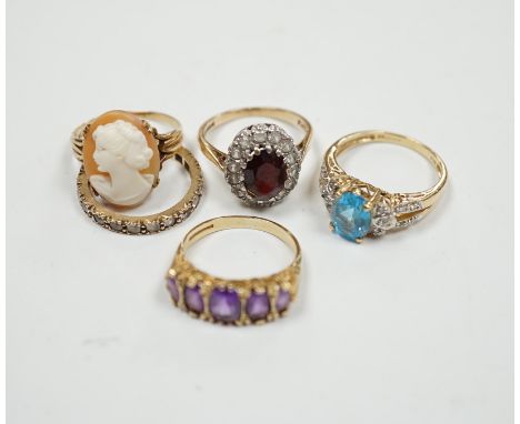 Five assorted modern 9ct and gem set dress rings, including graduated five stone amethyst and cameo shell, gross weight 14.7 