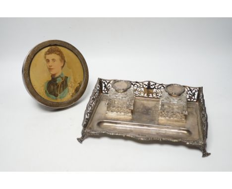 An Edwardian silver rectangular inkstand with pierced three quarter gallery and two mounted cut glass wells, William Hutton &