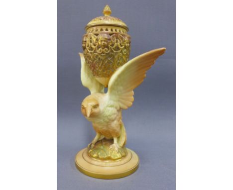 Grainger &amp; Co, Royal China Works Worcester pot pourri vase, pierced top and cover with finial, supported by a bird with w