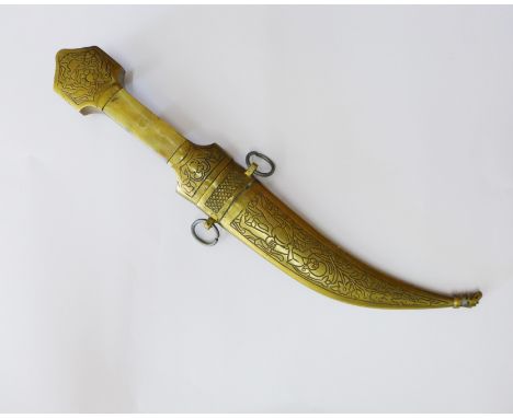 Eastern brass kukri style dagger with horn handle and steel blade, overall length 28cm