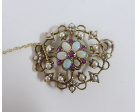 9ct gold opal and seed pearl brooch, of open work design with a central flowerhead of opals and pink gemstones within a surro