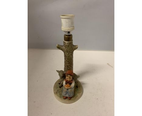 A WEST GERMAN GOEBOL LAMP BASE (LAMP CONNECTIONS A/F) DEPICTING A LITTLE GIRL WITH A LAMB 
