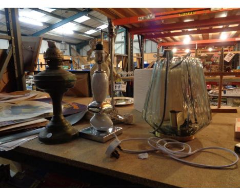 FOUR LAMP BASES PLUS AN OIL LAMP BASE 