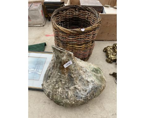 A "FOSSIL" CERAMIC VASE (HOLE TO BASE) AND A WOVEN BASKET 