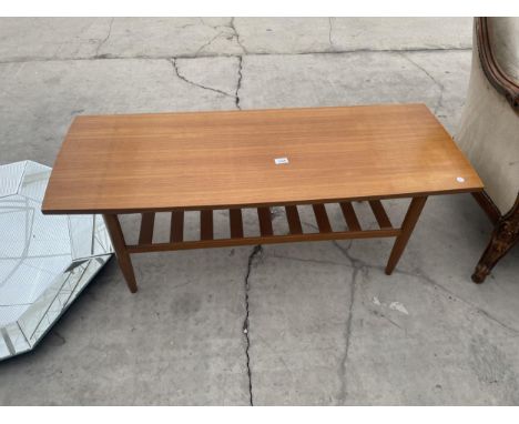 A RETRO TEAK COFFEE TABLE WITH MAGAZINE SHELF 47.5 INCH X 17.5 INCH 