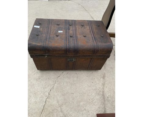 A METALWARE TRAVELLING TRUNK 