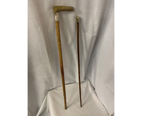 TWO ITEMS TO INCLUDE A WALKING STICK WITH A SILVER FINIAL AND A SWAGGER STICK WITH SILVER TOP 