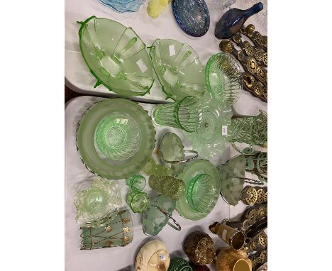 A COLLECTION OF GREEN GLASS WARE TO INCLUDE HANDLED DISHES, ART DECO STYLE FRUIT BOWLS, CAKE STAND, JUG ETC. 