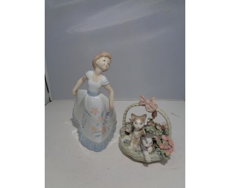 TWO FIGURINES, A NAO GIRL DANCING AND A LLADRO BASKET WITH KITTENS 