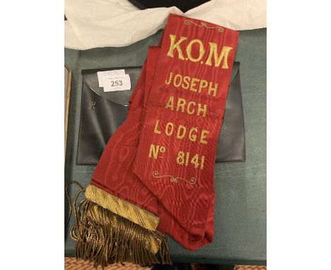 A MASONIC SASH IN A CASE 