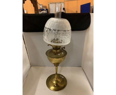 A LARGE BRASS AND OPAQUE GLASS SHADE OIL LAMP 