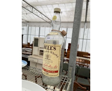 A LARGE BELLS SCOTCH WHISKY BOTTLE 