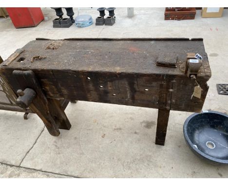 A VINTAGE WOOD WORK BENCH WITH WOODEN LEG VICE AND A SMALL RECORD BENCH VICE 
