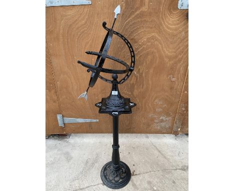 A VINTAGE CAST IRON ARMILARY SPHERE ON A CAST IRON PEDESTAL BASE 