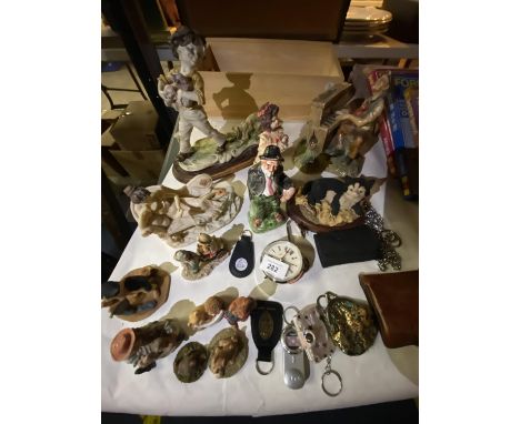 A QUANTITY OF ITEMS TO INCLUDE, CERAMIC FIGURINES, RESIN ANIMALS, SMOKERS POUCH, KEYRINGS, ETC 