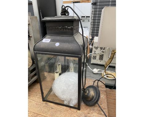 A LANTERN STYLE LIGHT FITTING 