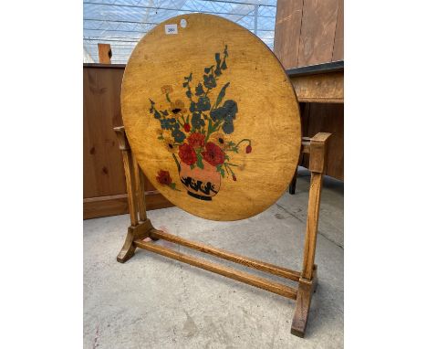 A MID 20TH CENTURY FIRE SCREEN TABLE WITH A FLORAL PAINTED TOP 