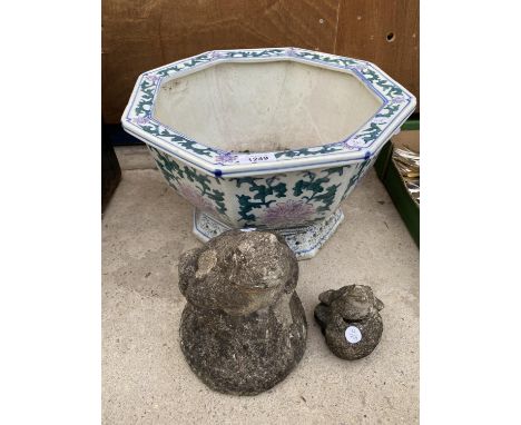 A DECORATIVE OCTAGONAL CERAMIC PLANTER AND TWO RECONSTITUTED STONE FROG GARDEN ORNAMENTS 