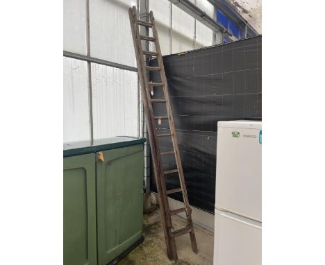 AN EXTENDING 26 RUNG WOODEN LADDER 