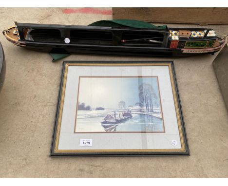 A FRAMED PRINT AND A MODEL OF A BOAT 